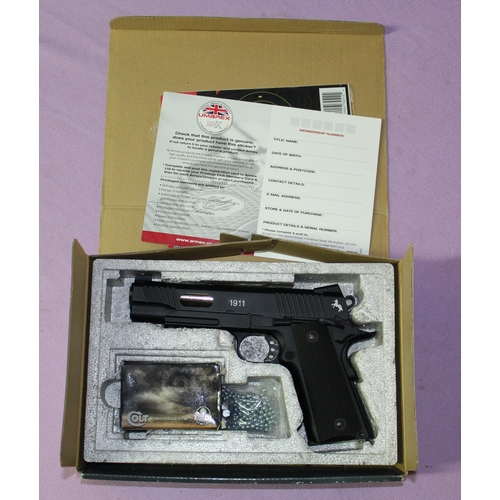 187 - Umarex Colt 1911 black custom metal semi-automatic CO2 powered air pistol, boxed with accessories. B... 