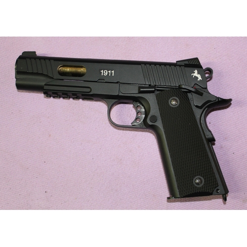 187 - Umarex Colt 1911 black custom metal semi-automatic CO2 powered air pistol, boxed with accessories. B... 