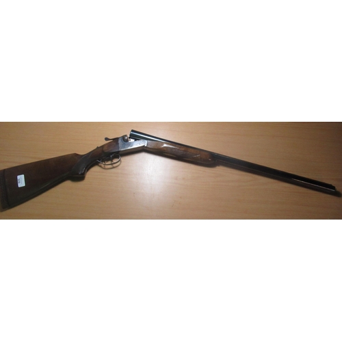 329 - Basque 12 bore side by side shotgun, with raised top vented rib,27 1/2 inch barrels, Serial number: ... 