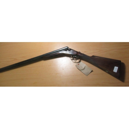 357 - Midland Gun Co 16B side by side shotgun, with 25 inch barrels, and 13 inch straight through stock, s... 