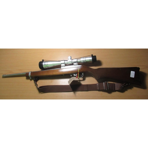 405 - Ruger model 10/22  .22 carbine rifle, fitted with Tasco scope and leather rifle sling with 2x  boxed... 