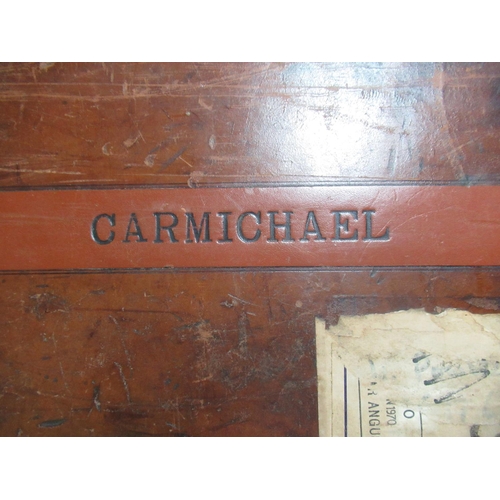 306 - Vintage leather gun case with brass mounted corners with central name Carmichael,  oak lined with tr... 