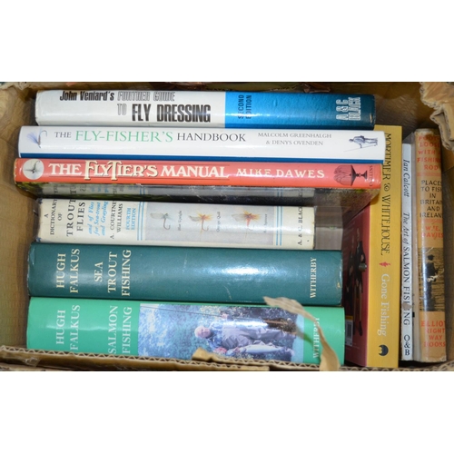 87 - A collection of books, DVDs and videos regarding fly fishing, Salmon running etc including 2 hardbac... 