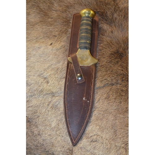 163 - Large C. Bark USA dagger with brass hand guard, large brass bolster, leather and brass bound handle ... 