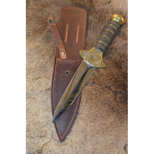 163 - Large C. Bark USA dagger with brass hand guard, large brass bolster, leather and brass bound handle ... 