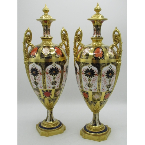 103 - Pair of Royal Crown Derby 1128 pattern porcelain two handled pedestal vases, ovoid bodies with integ... 