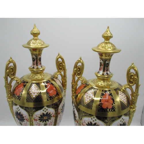 103 - Pair of Royal Crown Derby 1128 pattern porcelain two handled pedestal vases, ovoid bodies with integ... 