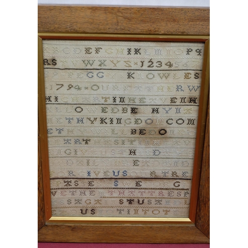 542 - Geo.III needlework sampler worked with alphabet, and Lords Prayer, by Peggy Knowles 1797, in oak fra... 