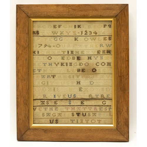 542 - Geo.III needlework sampler worked with alphabet, and Lords Prayer, by Peggy Knowles 1797, in oak fra... 