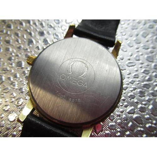 324 - 1970's Omega gold plated hand wound wristwatch, with date, silvered dial with applied indices and ce... 