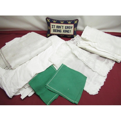 545 - Set of eleven green napkins, cushion with slogan “It ain’t Easy Being King”, large cream damask tabl... 