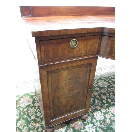 554 - Regency mahogany bow breakfront pedestal sideboard, three frieze drawers with brass ring handles, on... 