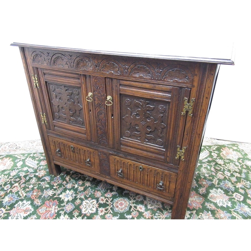 560 - C18th style oak side cabinet, carved frieze above two doors and two arcade carved drawers, W102cm D5... 