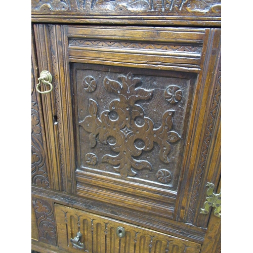 560 - C18th style oak side cabinet, carved frieze above two doors and two arcade carved drawers, W102cm D5... 