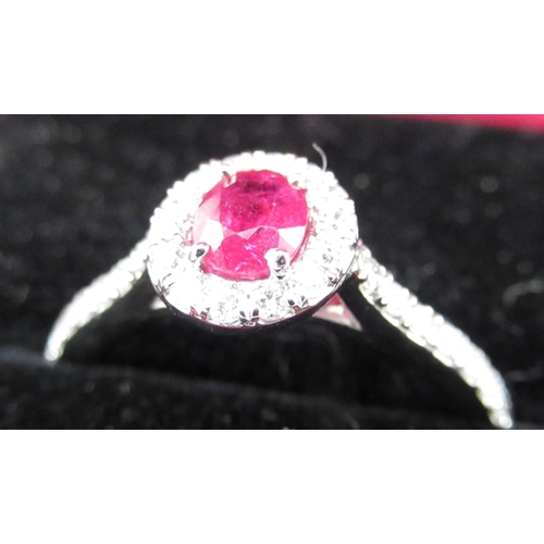 62 - Platinum set ruby and diamond ring of approx. 80points