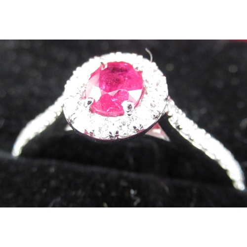 62 - Platinum set ruby and diamond ring of approx. 80points