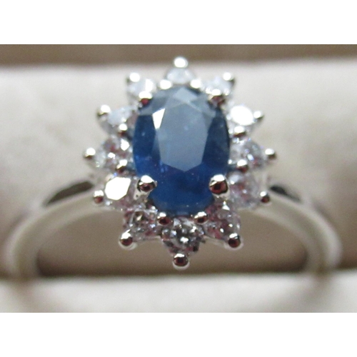 64 - Platinum set sapphire and diamond ring of approx. 90 points