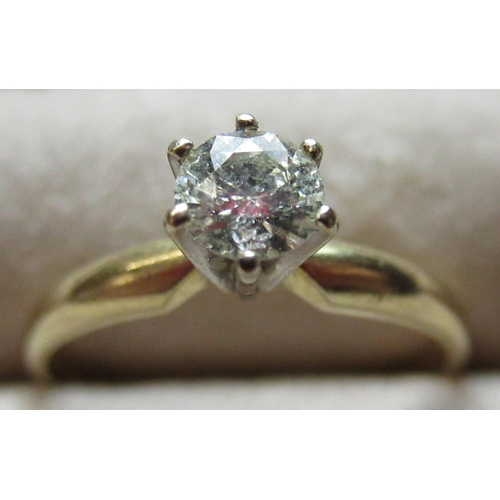 65 - 18ct yellow gold solitaire diamond ring of approx. 25 points