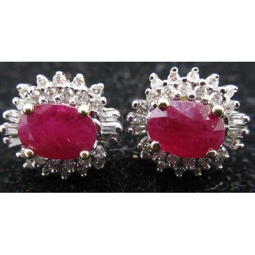 69 - Pair of 18ct yellow gold ruby and diamond earrings approx. 2ct