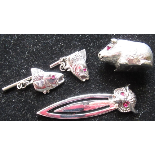 73 - Sterling silver guinea pig with red eyes, pair of silver cufflinks in the form of fish with ruby eye... 