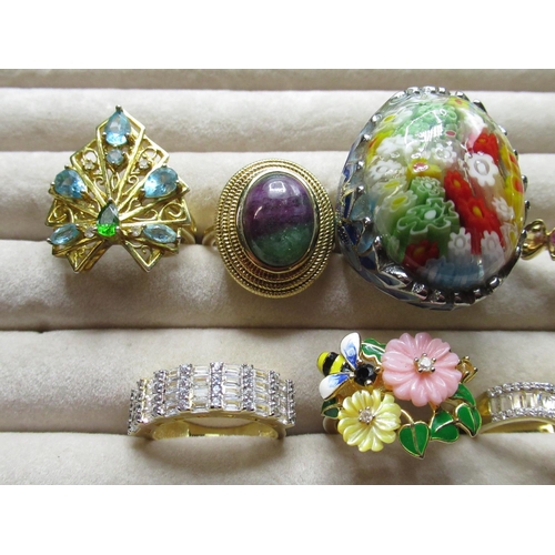 25 - Millefiori costume ring and a collection of sterling silver rings, set with a variety of different s... 