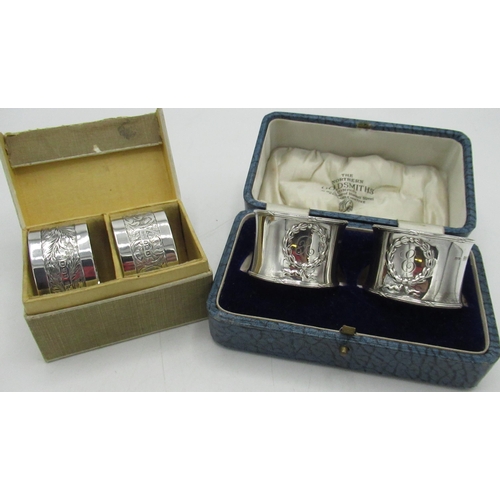 97 - Pair of Geo.V hallmarked sterling silver napkin rings with repousse wreath and initialled R, by Dock... 