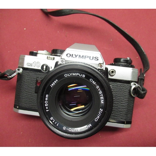 1206 - Olympus OM10 camera with 50mm lens and Olympus T20 flashgun in grey carry bag