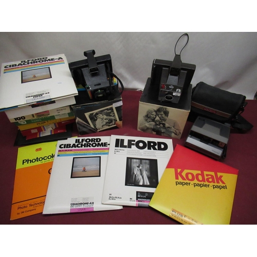 1212 - Two boxed Polaroid Super Swinger cameras, Polaroid Image camera, selection of various photographic p... 