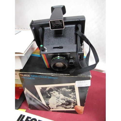 1212 - Two boxed Polaroid Super Swinger cameras, Polaroid Image camera, selection of various photographic p... 