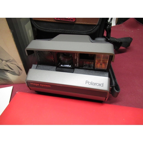 1212 - Two boxed Polaroid Super Swinger cameras, Polaroid Image camera, selection of various photographic p... 