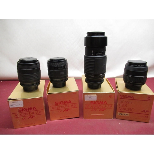 1197 - Nikon auto focus Sigma lenses, including two 70-210mm lenses (one A/F), 50mm F2.8 macro lens and a  ... 