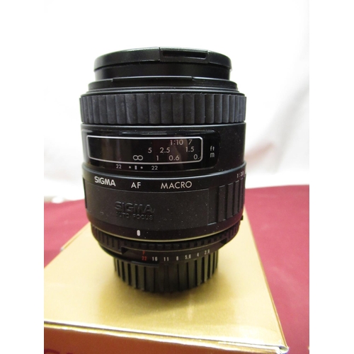 1197 - Nikon auto focus Sigma lenses, including two 70-210mm lenses (one A/F), 50mm F2.8 macro lens and a  ... 