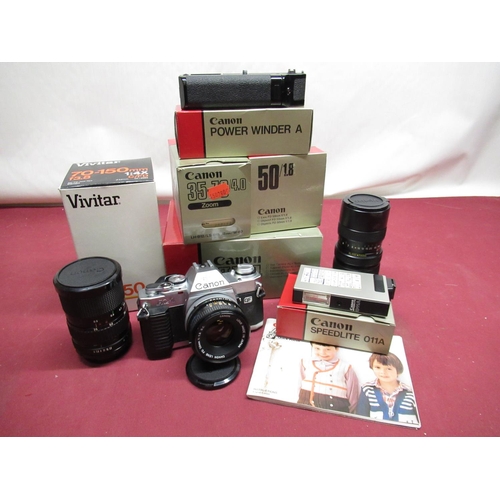 1198 - Canon AL-1 SLR camera with Canon 50mm F1.8 lens, Canon 35-70mm lens, Vivitar 70-150mm lens, power wi... 