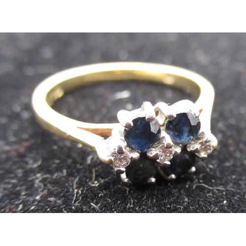 14 - Hallmarked 18ct yellow gold diamond and sapphire ring, four claw set round cut sapphires  and three ... 