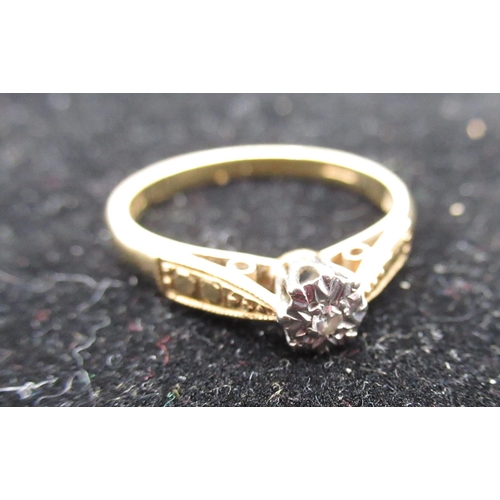 15 - Hallmarked 18ct yellow gold diamond solitaire ring, round cut diamond, illusion set in a white metal... 