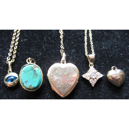 25 - 9ct yellow gold bright cut heart shaped locket, on a link chain necklace, another with an eye pendan... 