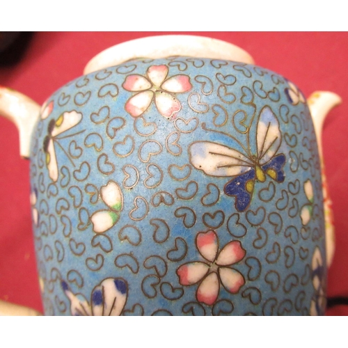 453 - Cloisonne on porcelain four person tea service decorated with foliage and butterflies on a blue grou... 