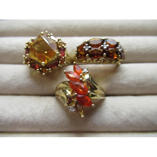41 - 9ct yellow gold ring, four marquise cut red stones with two claw set diamonds, a 9ct yellow gold rin... 