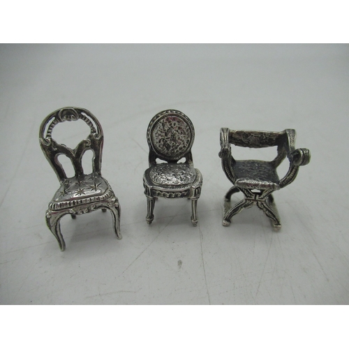 90 - Set of six continental sterling silver miniature period chairs with a small display shelf 1.83ozt