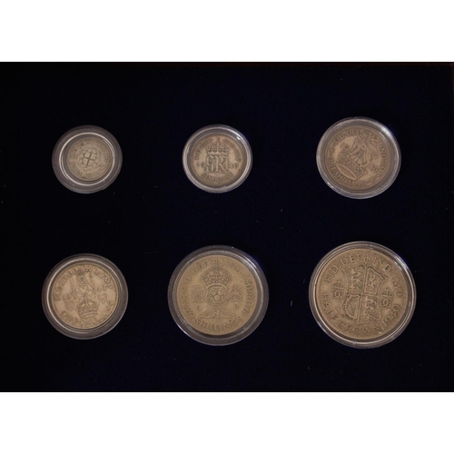 703 - Collection of framed coins from the Danbury Mint British Coin Treasures collection together with a B... 