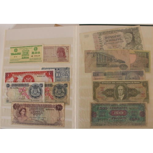 719 - collection of UK, commonwealth and world banknotes in two albums, (all pages photographed)