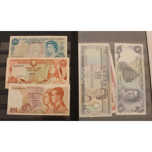 719 - collection of UK, commonwealth and world banknotes in two albums, (all pages photographed)