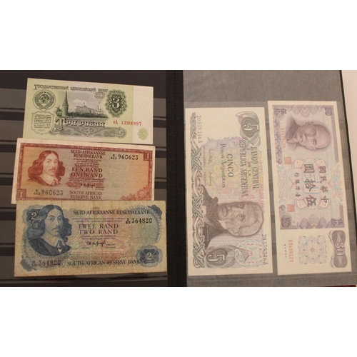 719 - collection of UK, commonwealth and world banknotes in two albums, (all pages photographed)