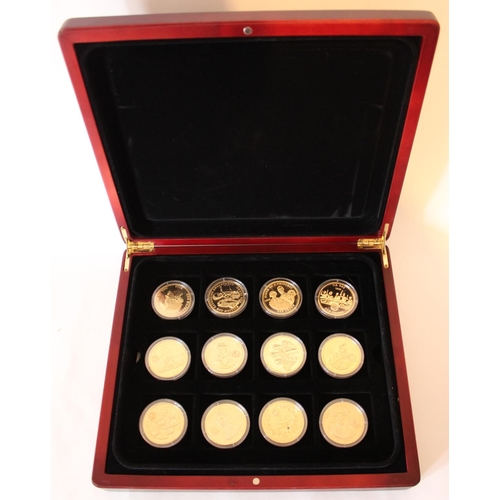 724 - London Mint Royal House of Windsor coin collection, consisting 24 gold plated Royal commemorative co... 