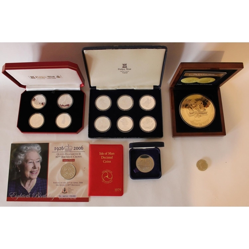 725 - Collection of Commemorative coins and medallions to include Pobjoy Mint Gibraltar 1996 Peter Rabbit ... 