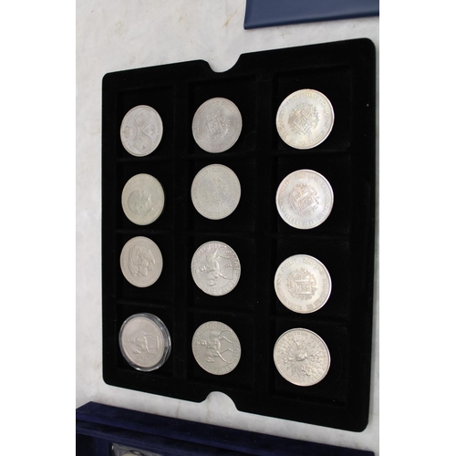 304 - Collection UK commemorative, 5 shillings and £5 coins presented in Westminster blue velvet case (24)... 