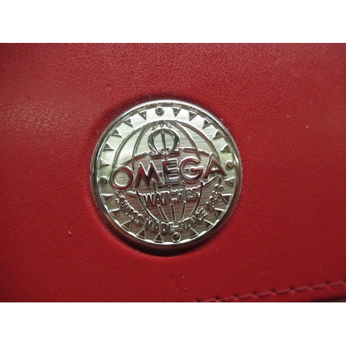 150 - Late 1990s Omega red leather wristwatch box, together with outer slip case