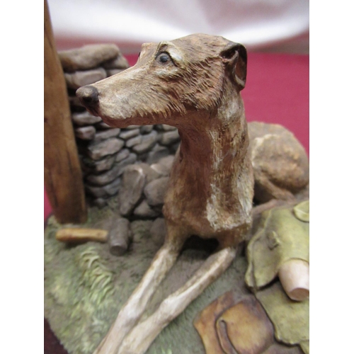 174 - Large Border Fine Arts group of a seated lurcher beside on a stone wall, D18cm H13cm