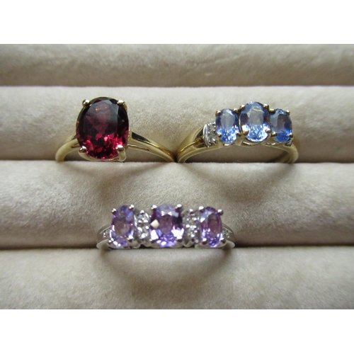 44 - 9ct white gold ring set with diamonds separating lilac stones, size O, 9ct yellow gold ring set with... 