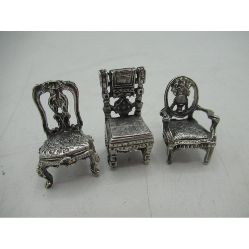 90 - Set of six continental sterling silver miniature period chairs with a small display shelf 1.83ozt